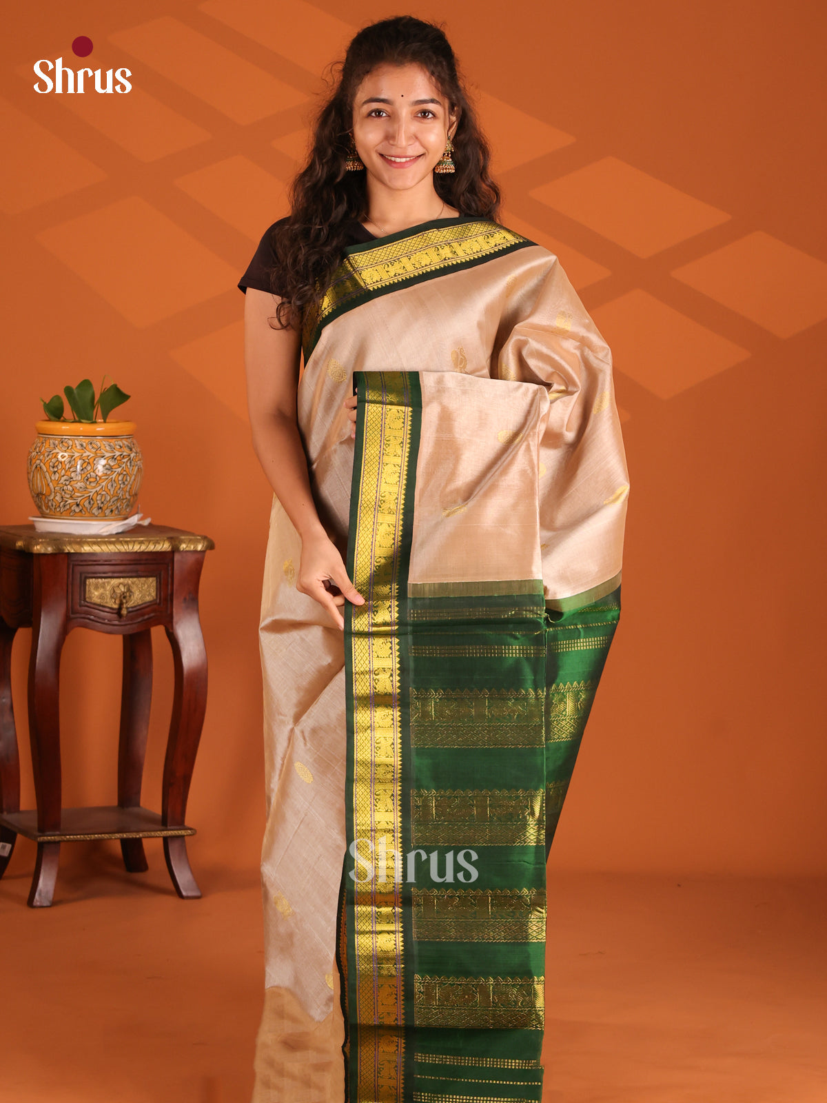 Elegant Cream & Green Silk Cotton Saree With Subtle motifs & Zari Border - Shop on Shrus.com
