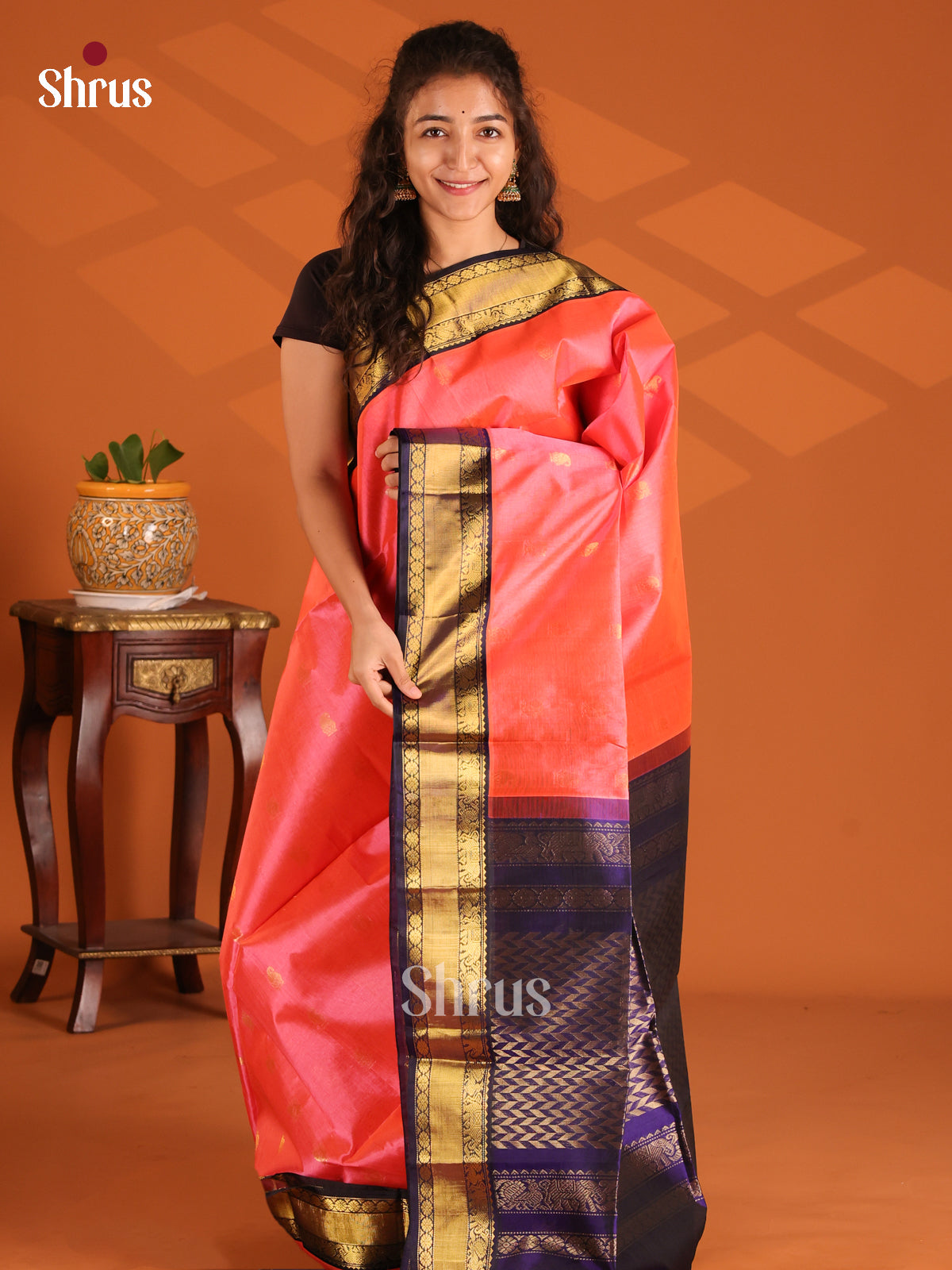 Radiant Orangish Pink Silk Cotton Saree with Zari Buttas & Purple Zari Pallu - Shop on Shrus.com