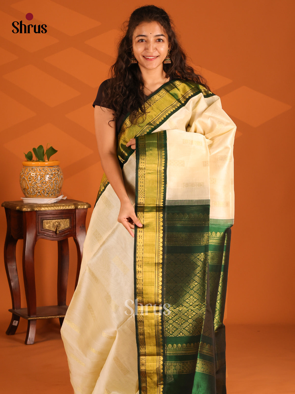 Beautiful Cream Silk Cotton Saree with contrast Green zari floral brocade pallu - Shop on Shrus.com