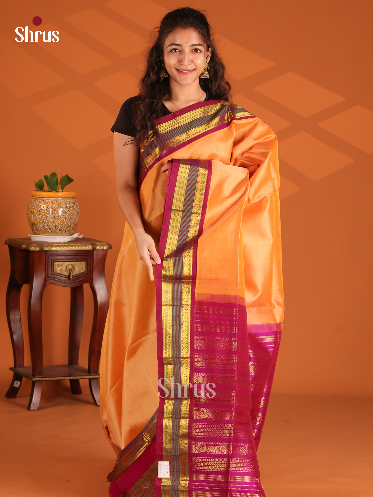 Radiant Orange Silk Cotton Saree with Purple zari striped Pallu