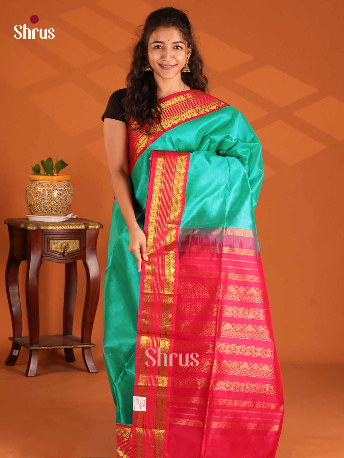Ethereal Green Silk Cotton Saree with contrast Red rettaipet zari border - Shop on Shrus.com