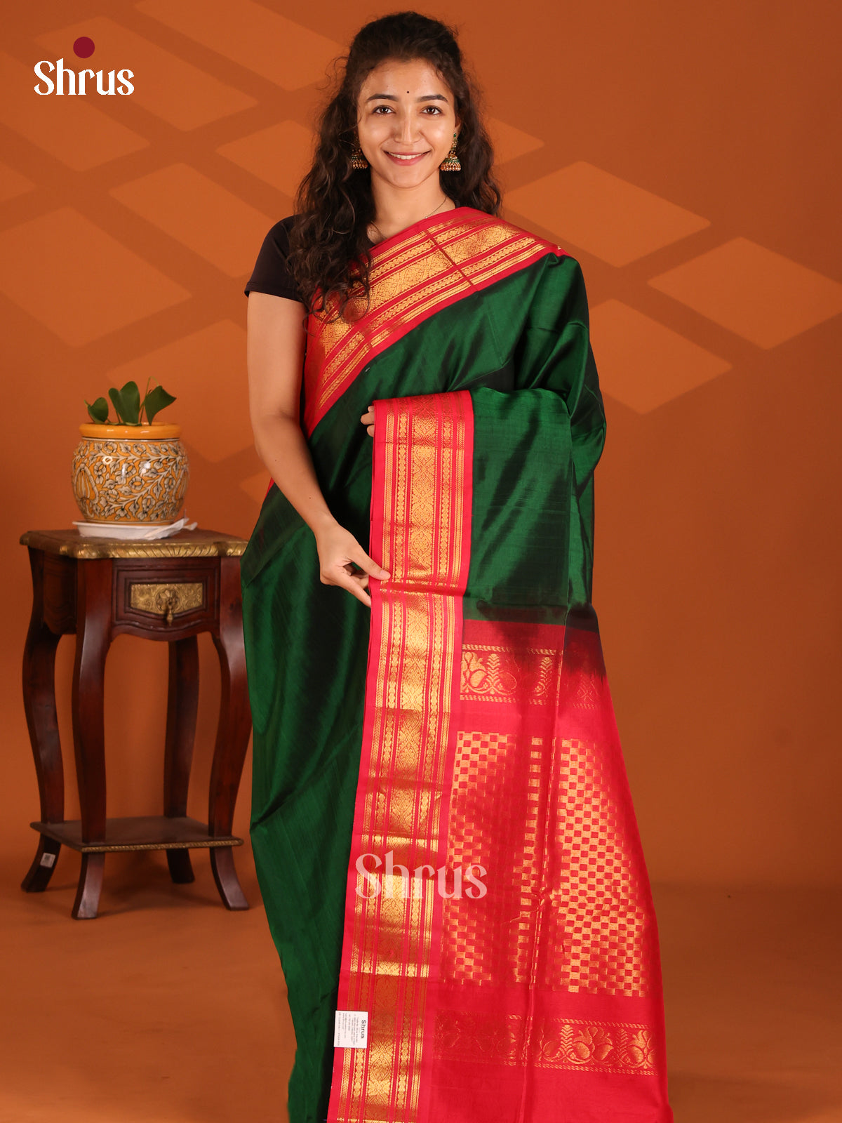 Timeless Bottle Green Silk Cotton Saree with floral vine Red zari border - Shop on Shrus.com