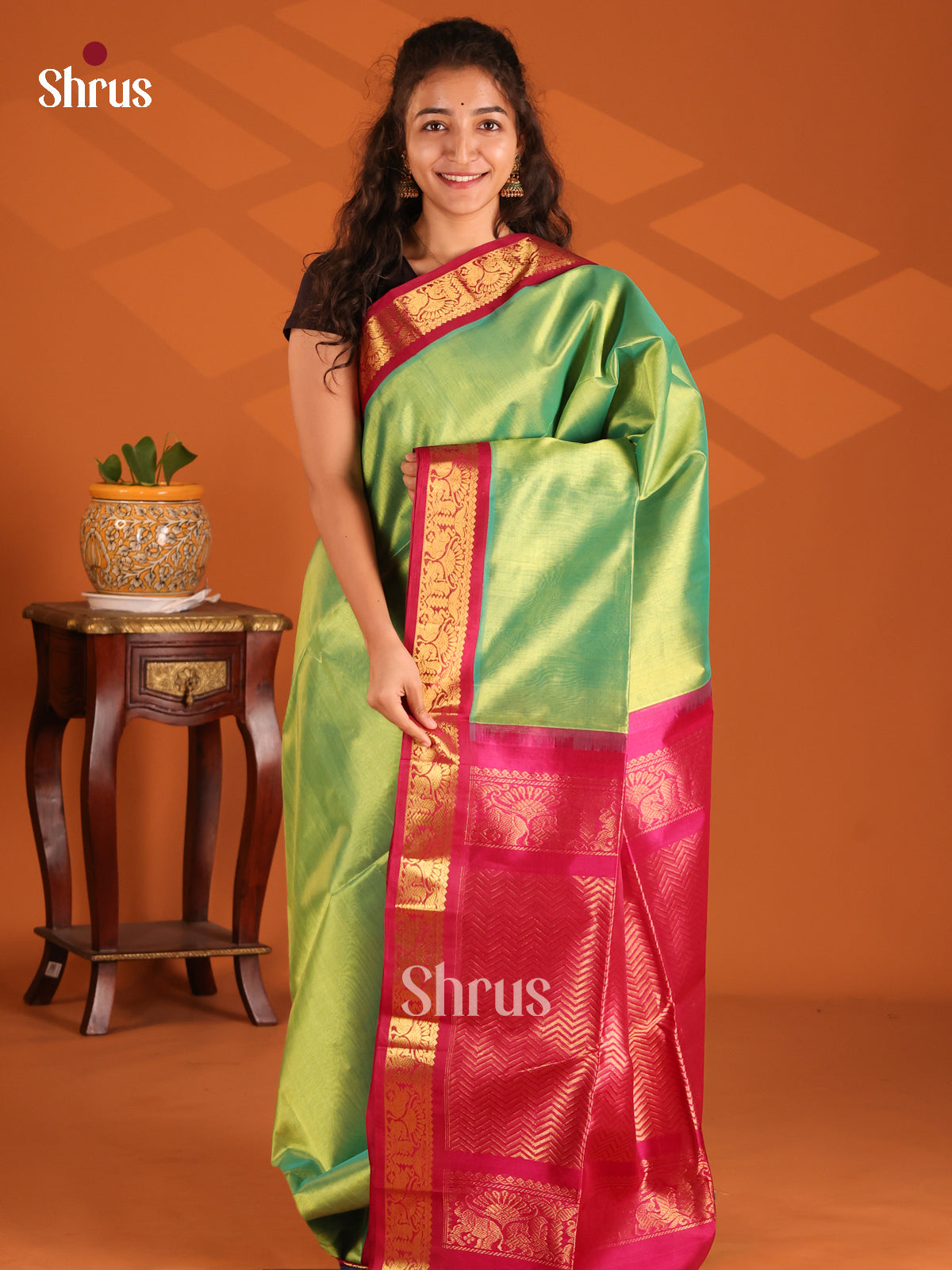 Shimmery Lite Green Silk Cotton Saree with gold zari peacock & elephant buttas - Shop on Shrus.com