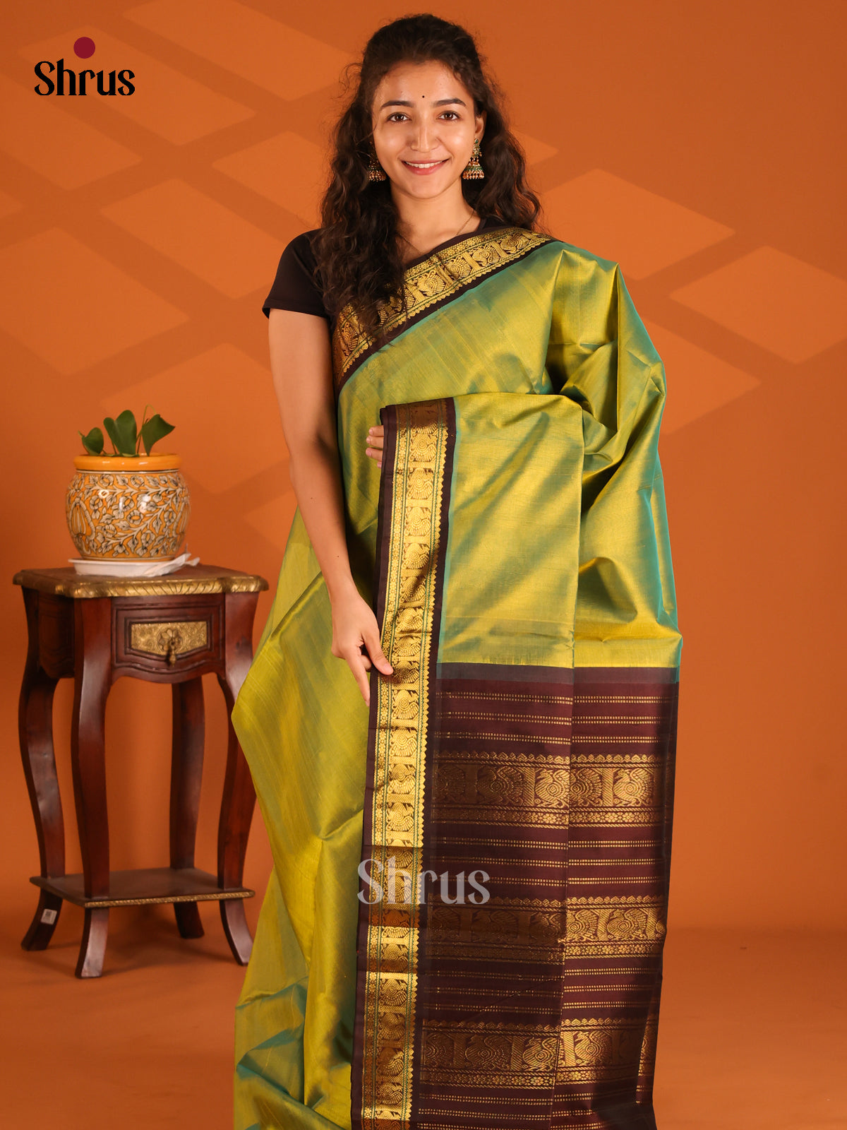 Serene Lite Green Silk Cotton Saree with Peacock zari butta brown Border - Shop on Shrus.com