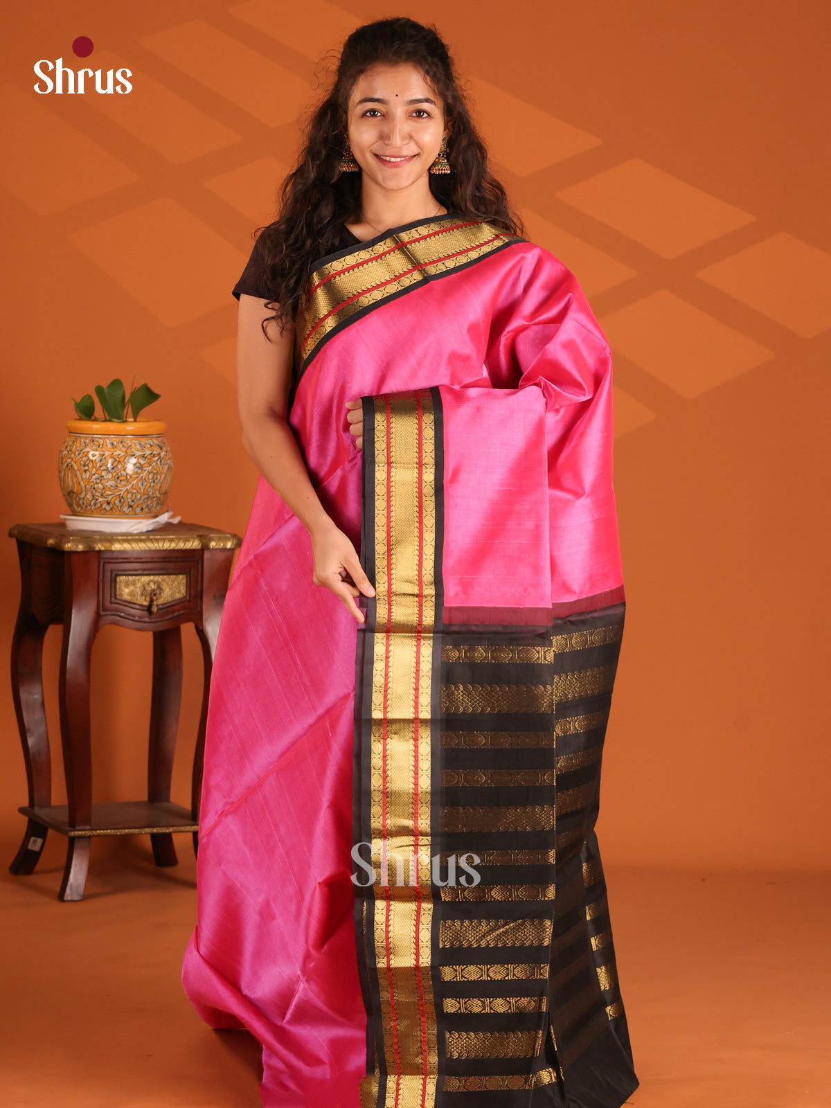Deep Pink Silk Cotton Saree with simple plain body , black zari border