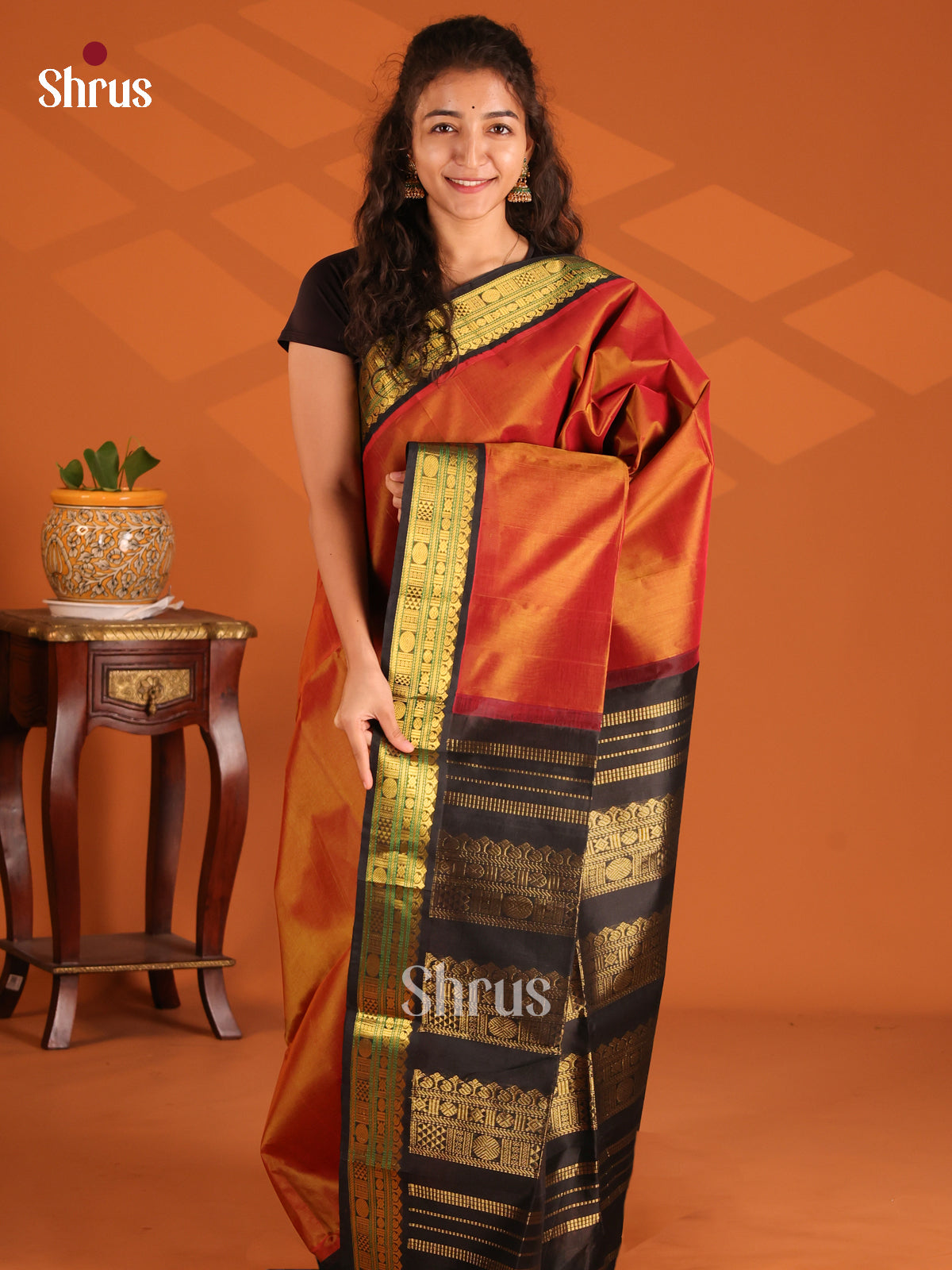 Radiant Orange Silk Cotton Saree with contrast Black zari border - Shop on Shrus.com
