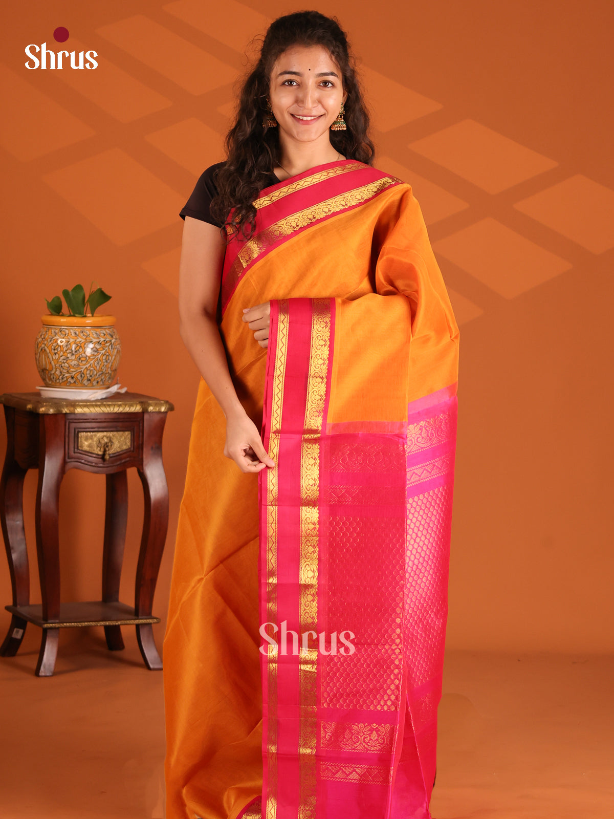 Luminous Mustard Silk Cotton Saree with pink rettaipet zari border - Shop on Shrus.com