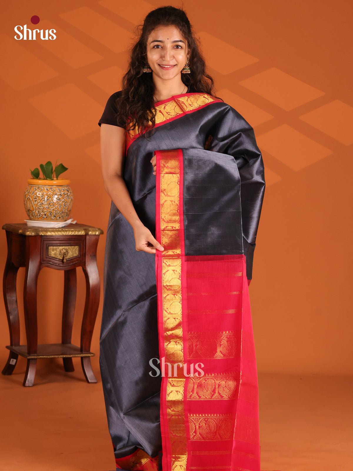 Beautiful Black Silk Cotton Saree with gold zari peacock motifs in Red border - Shop on Shrus.com