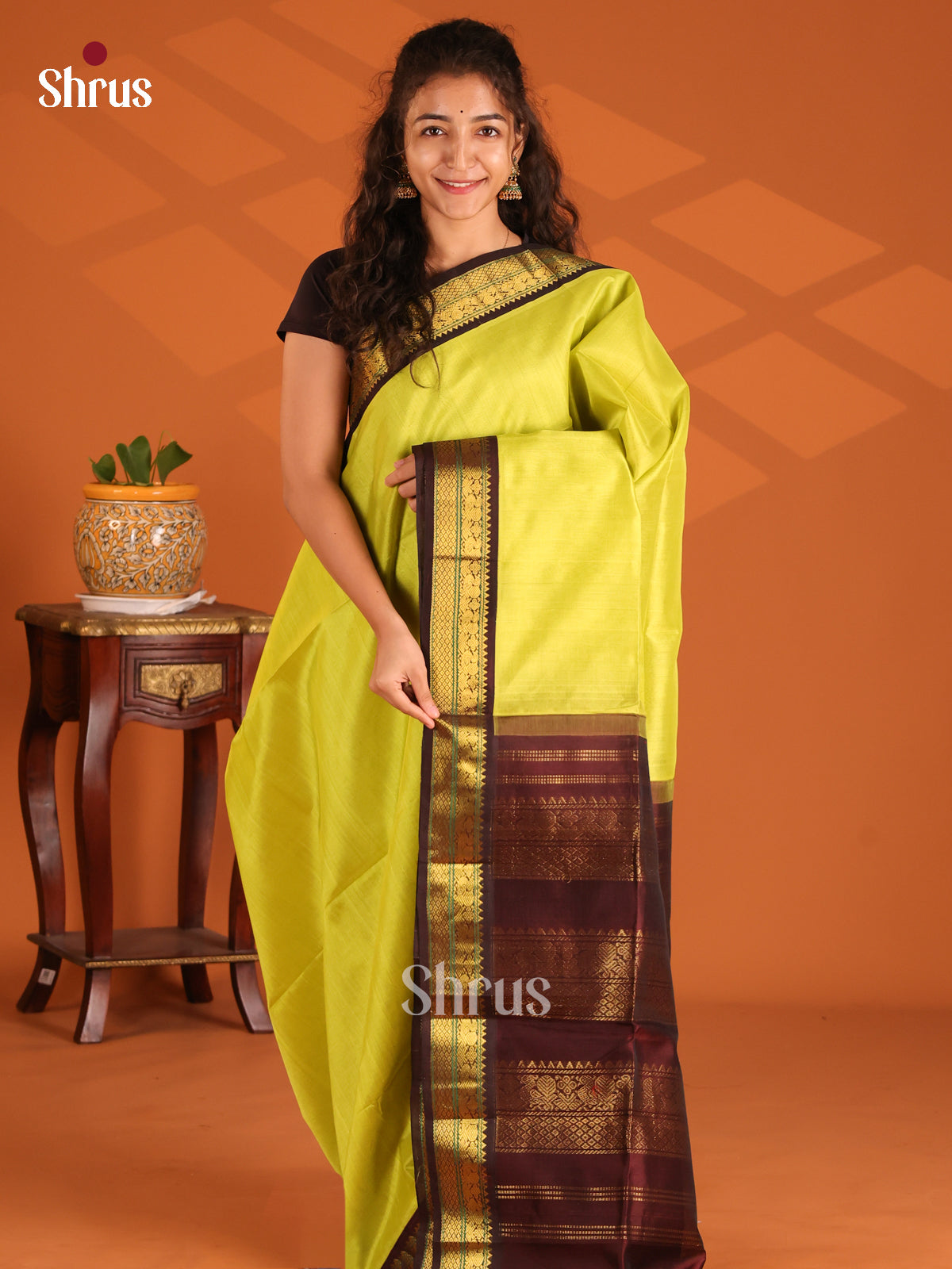 Green and Brown Silk Cotton Saree with woven peacock buttas zari border - Shop on Shrus.com