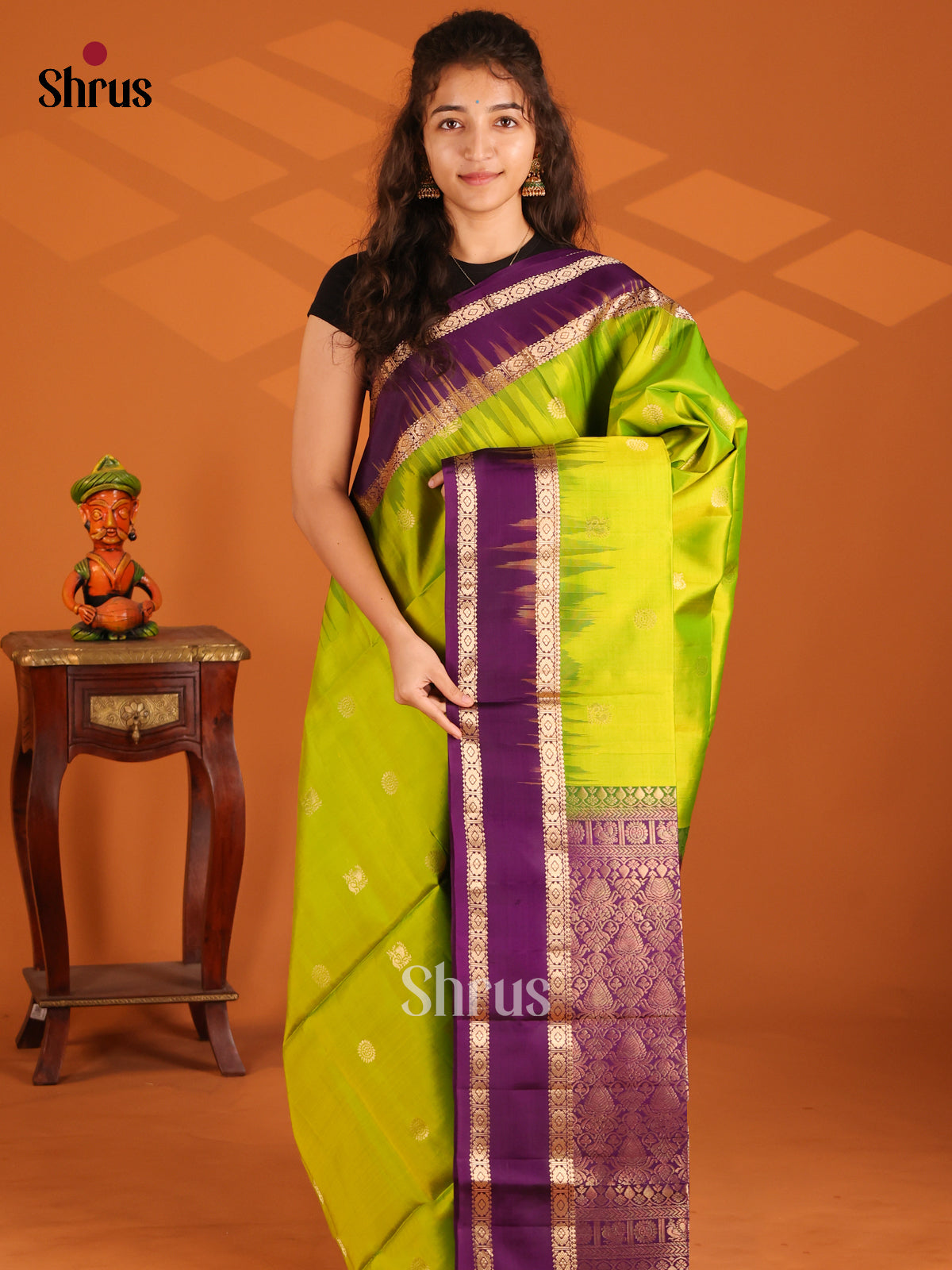 Regal Parrot Green Soft Silk Saree with gold peacock , floral buttas , purple rettaipet border - Shop on Shrus.com