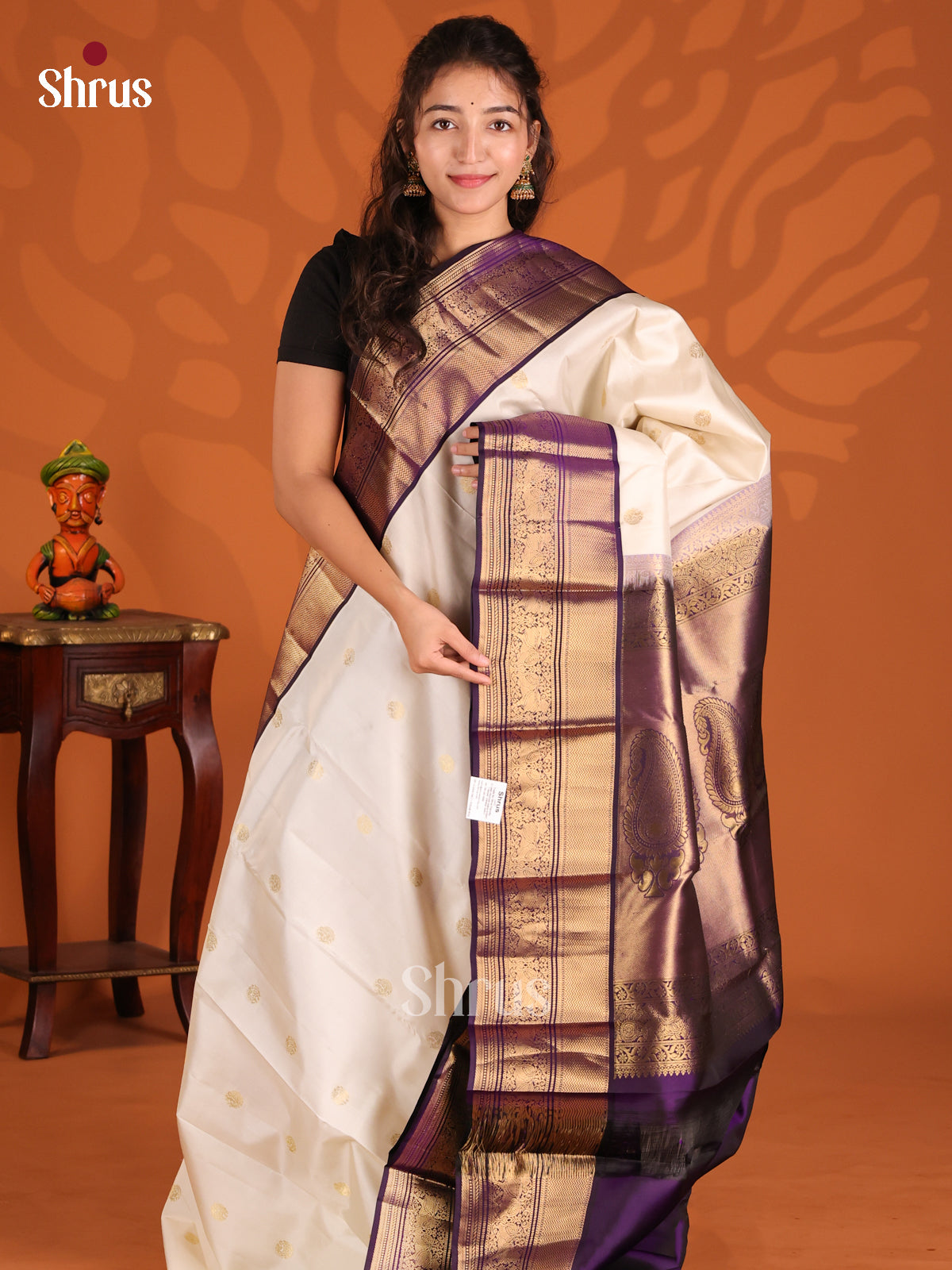 Cream & Violet Kanchipuram silk Saree dazzles with gold zari floral buttas - Shop on Shrus.com