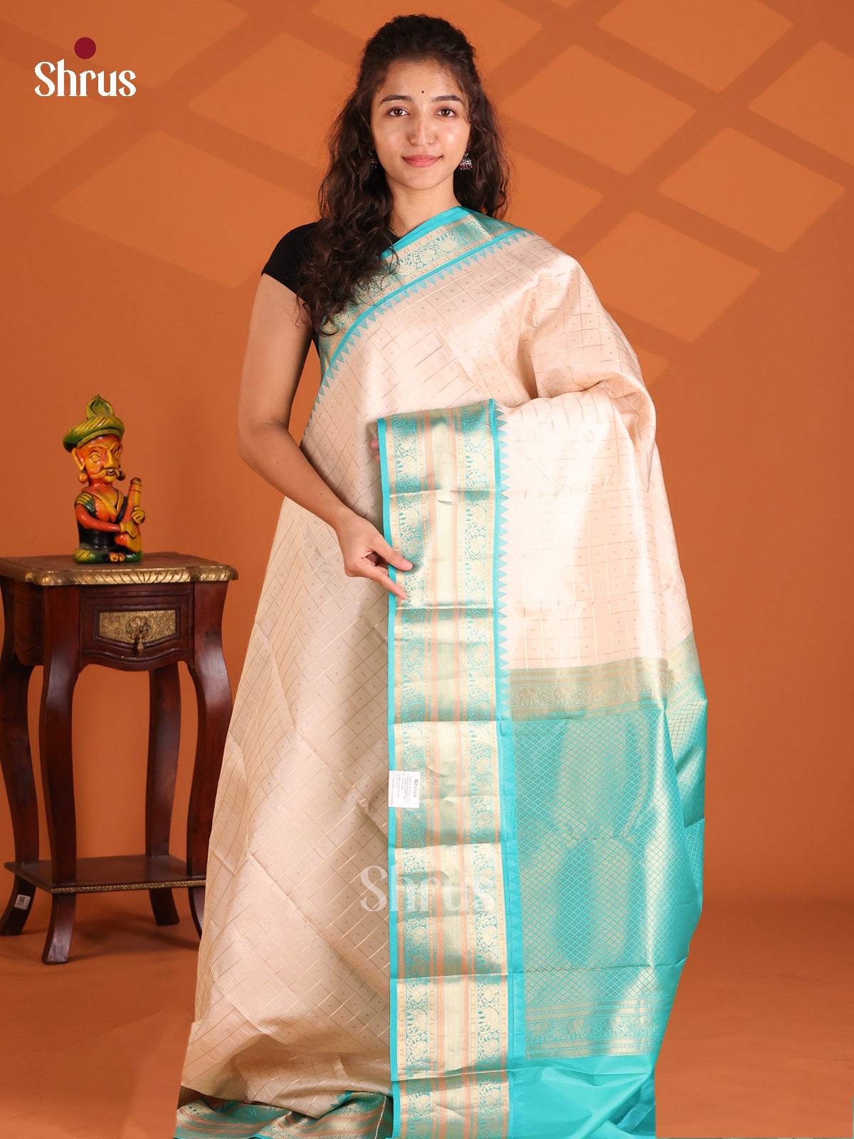 Cream & Teal Checked Kanchipuram silk Saree with zari elephant & peacock buttas Border