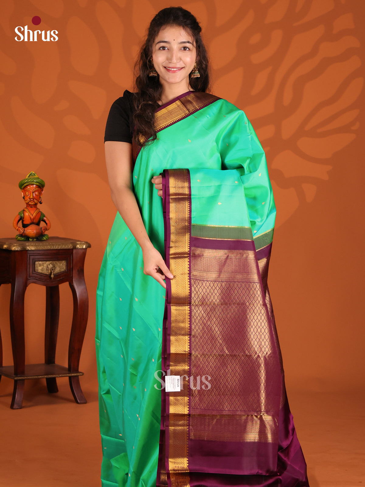 Enchanting Teal Green Kanchipuram silk Saree with contrast criss cross brocade pallu - Shop on Shrus.com