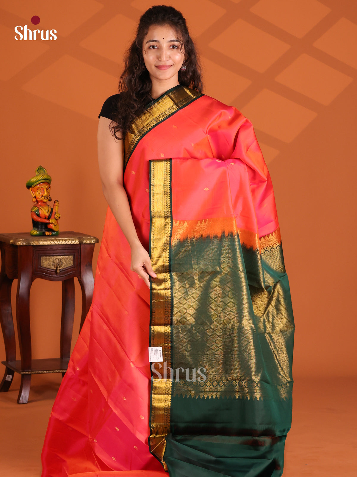 Pretty Orange Kanchipuram silk Saree with Green splendid brocade pallu-1