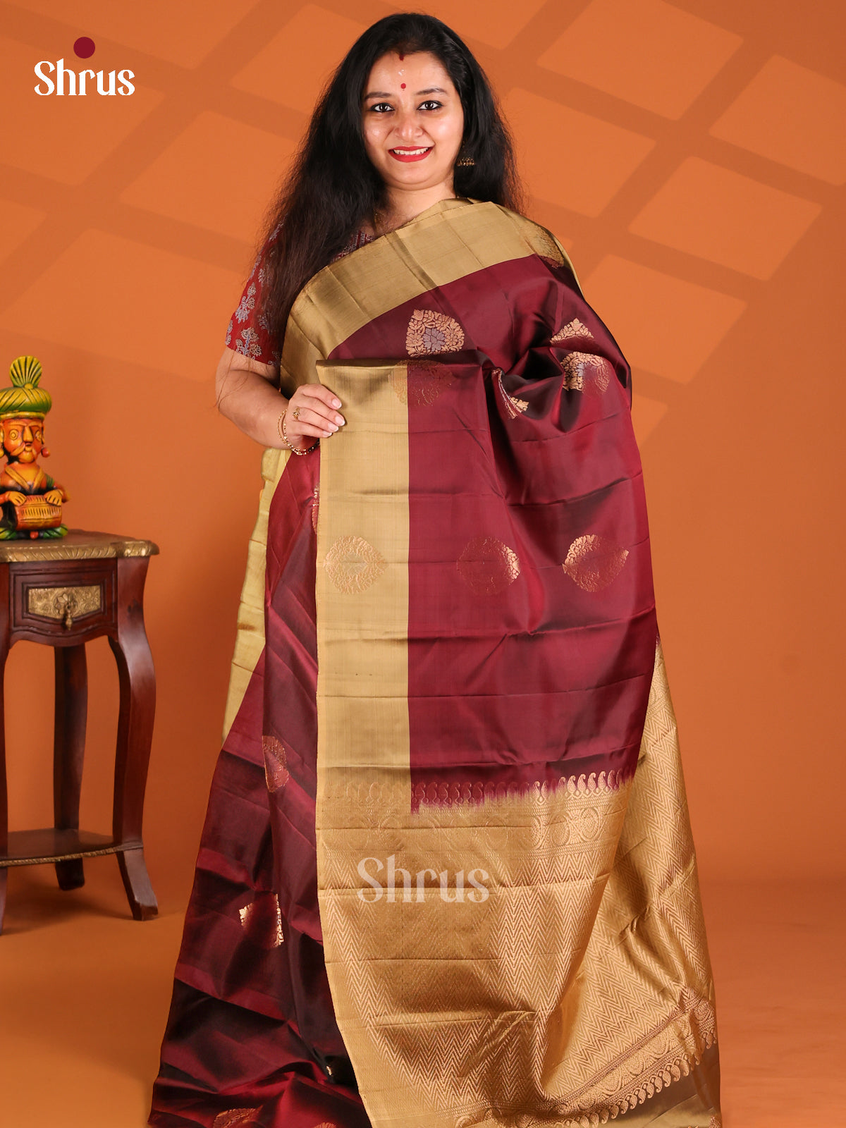 Vivacious Maroon Softsilk-halfpure Saree with gold, silver zari motifs