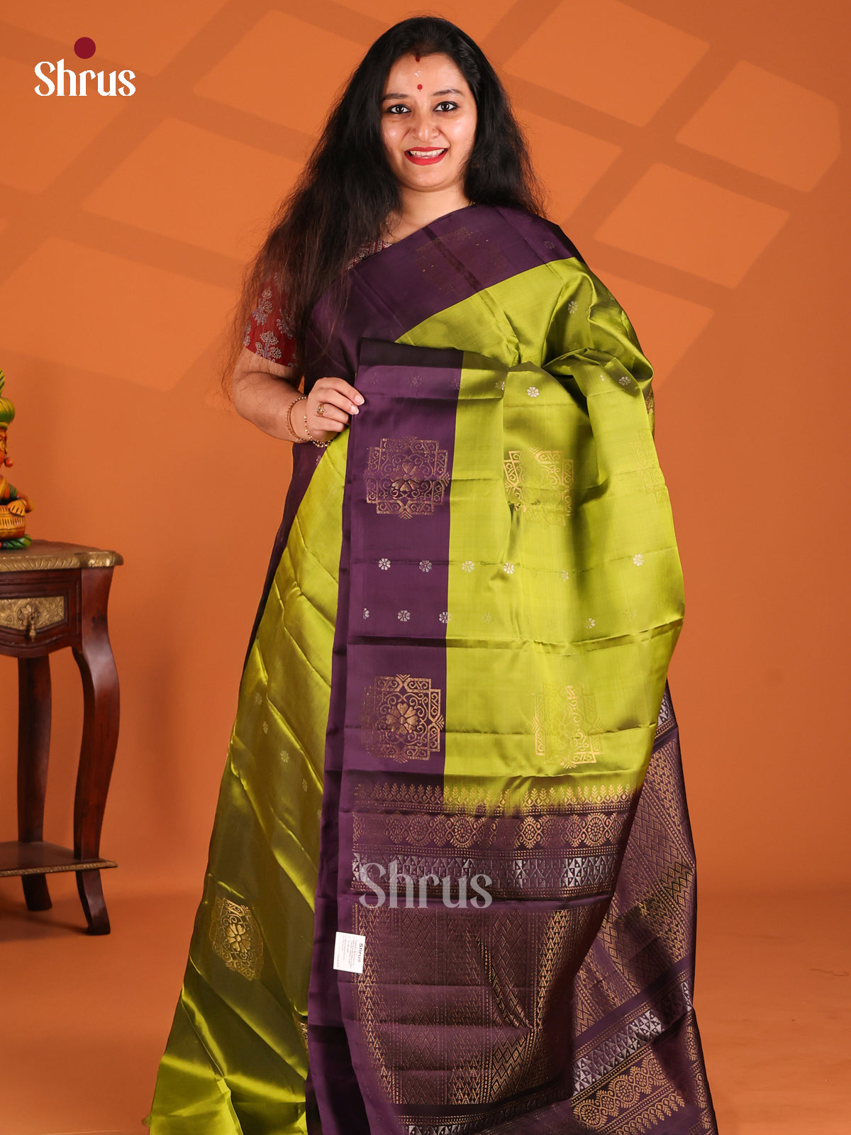 Glimmering Green Softsilk-halfpure Saree with gold , silver zari motifs - Shop on Shrus.com