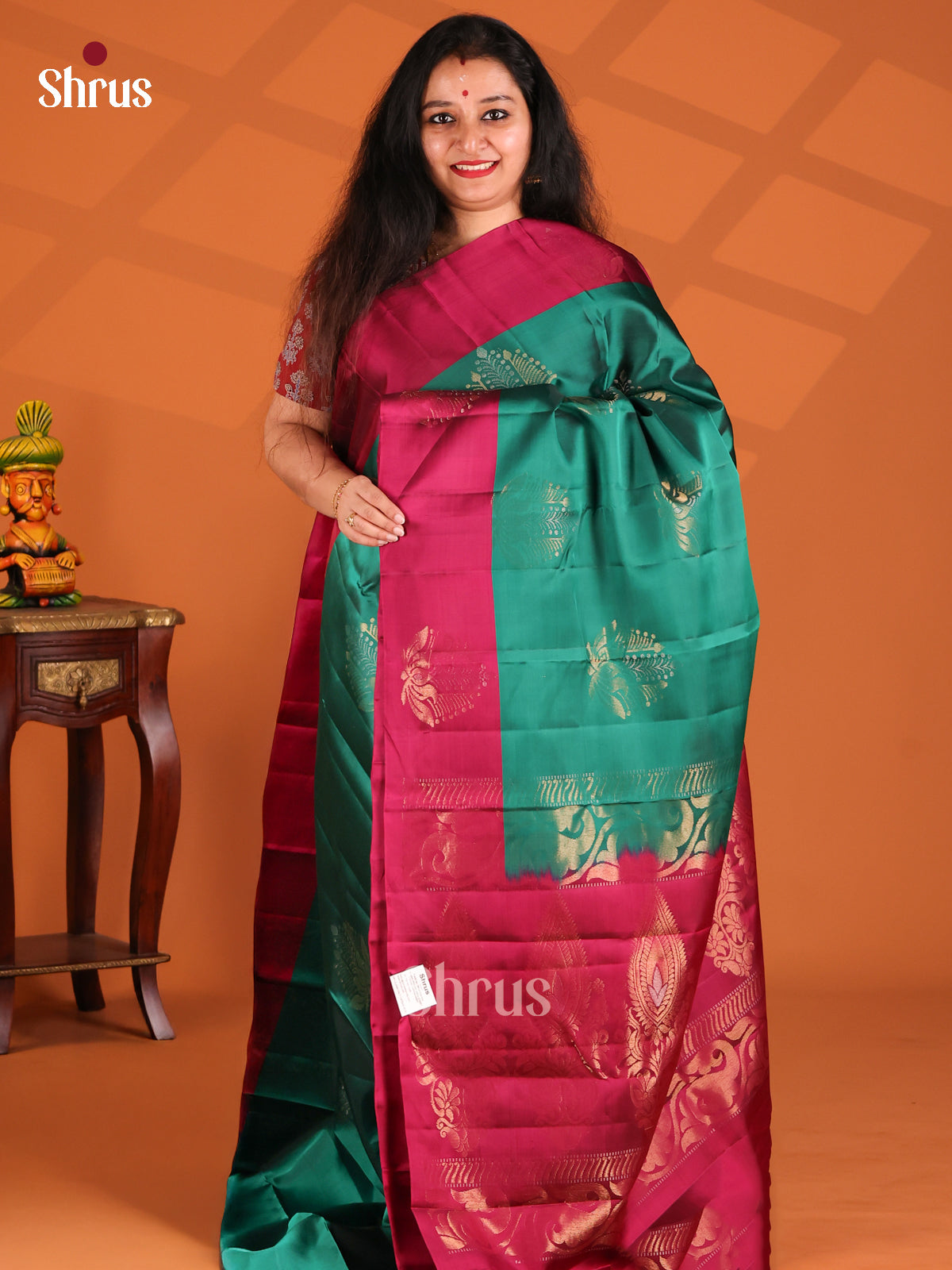 Stunning Green Softsilk-halfpure Saree with gold zari motifs , brocade maroon pallu