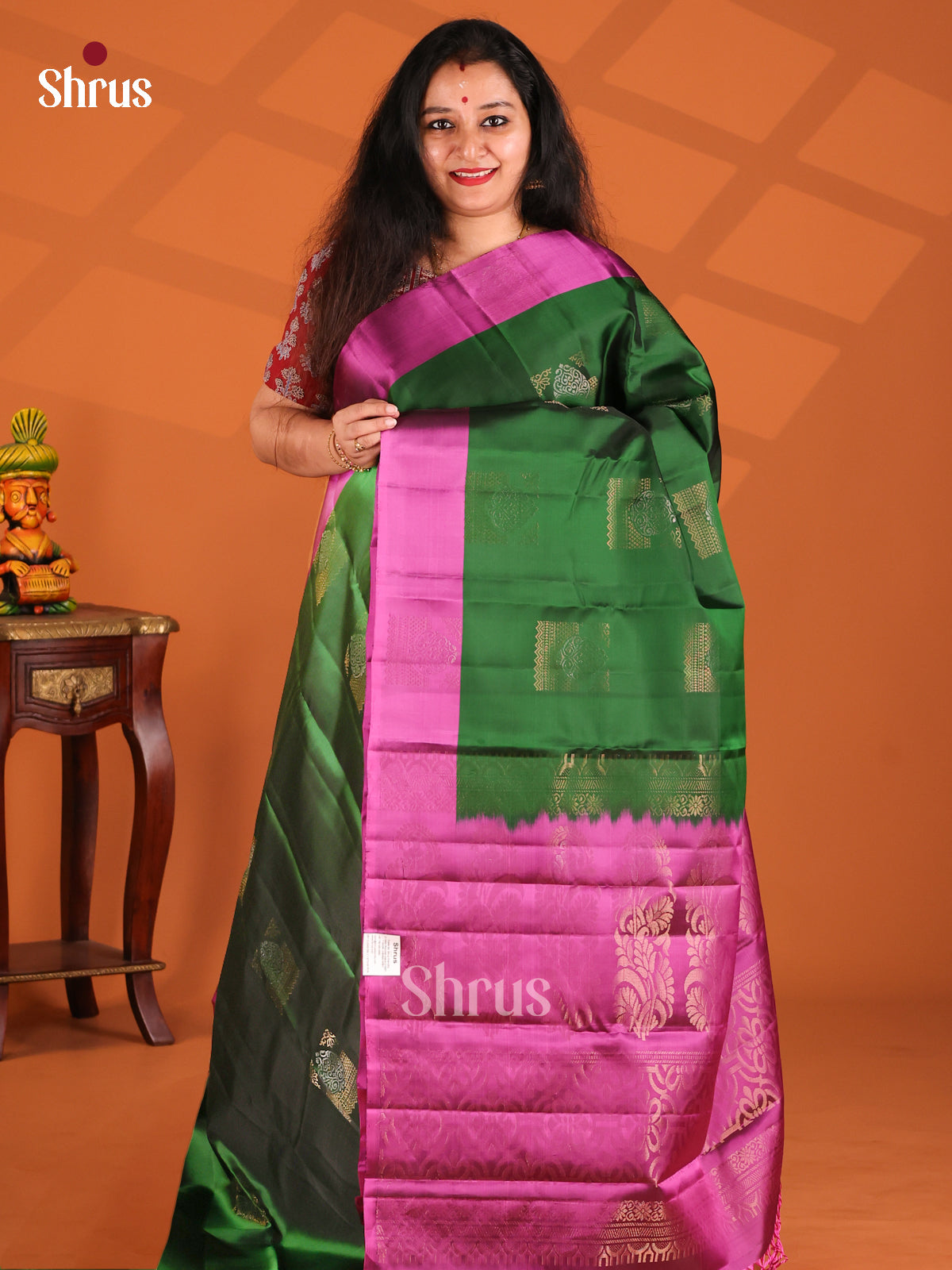 Classy Green & Purple Softsilk-halfpure Saree with zari block motifs
