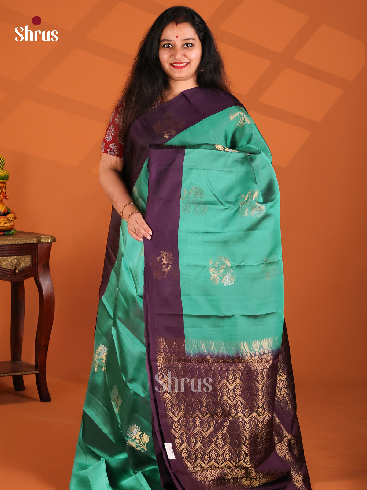 Lustrous Green Softsilk-halfpure Saree gleams with floral butta - Shop on Shrus.com