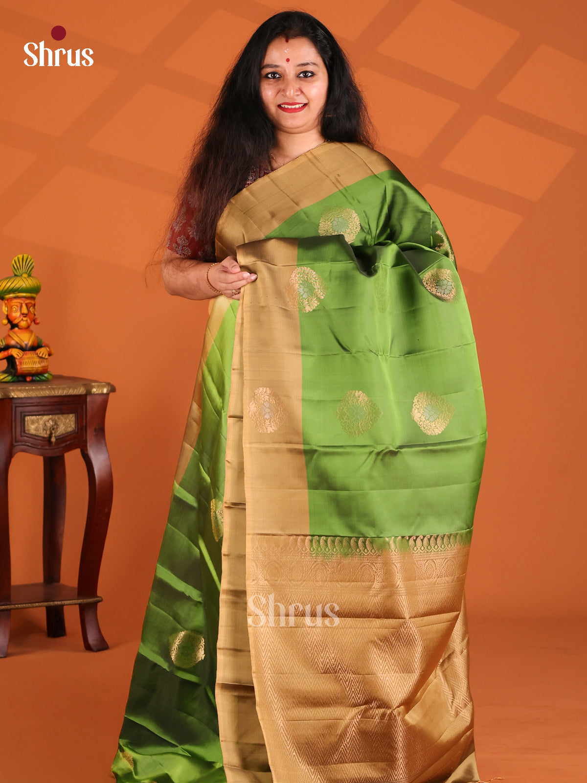 Dazzling Green Softsilk-halfpure Saree with contrast gold brocade pallu