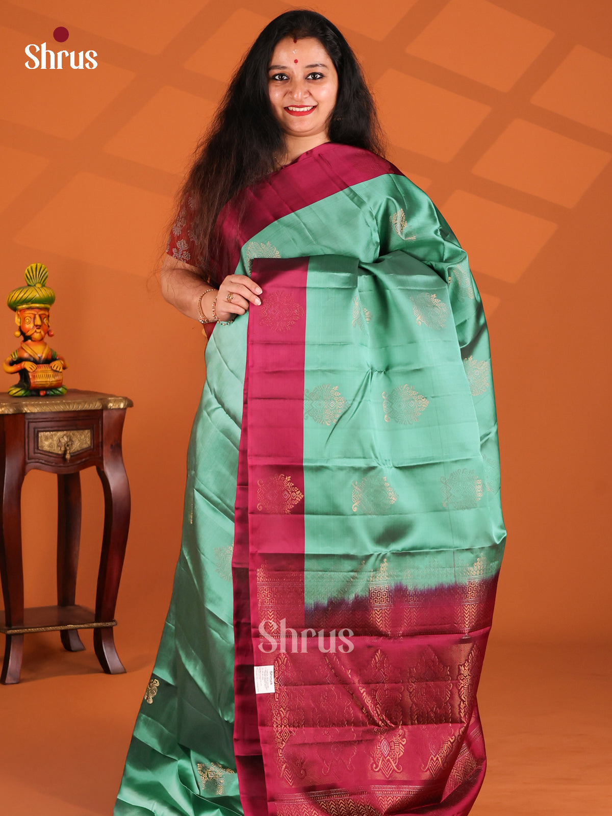 Lustrous Green Softsilk-halfpure Saree with maroon zari brocade pallu