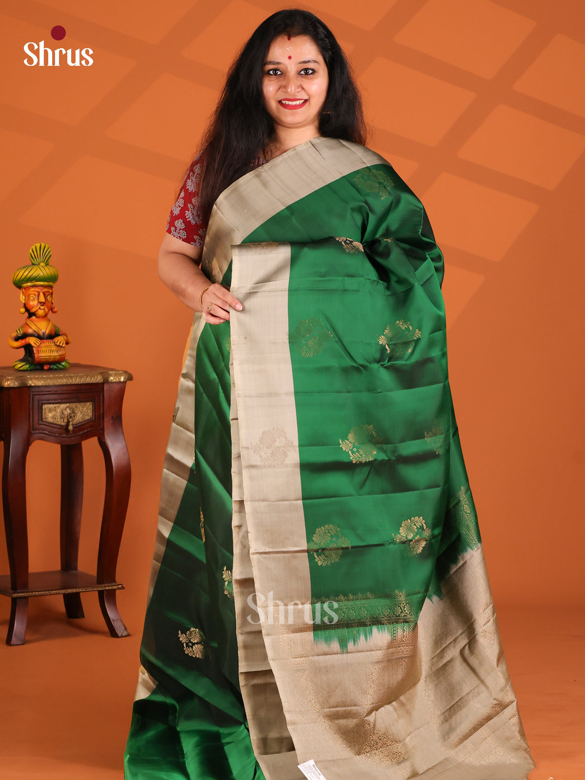 Classy Green Softsilk-halfpure Saree with grey floral nestling brocade pallu