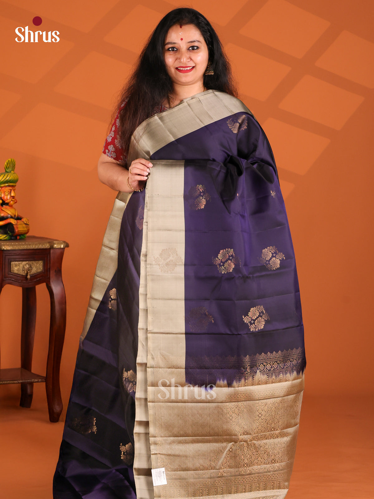 Beautiful Blue Softsilk-halfpure Saree gleams with gold zari floral buttas