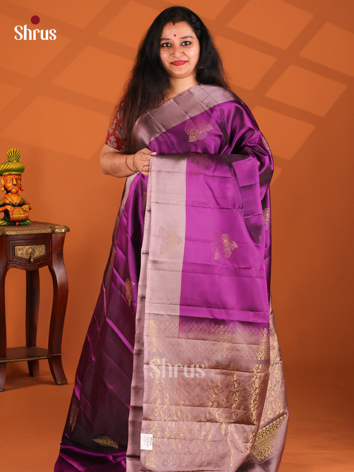 Charming Purple Softsilk-halfpure Saree with floral nestling brocade pallu