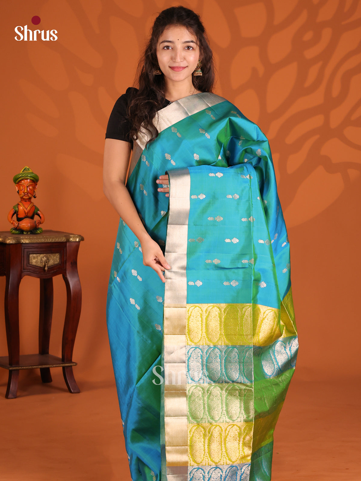 Peacock Blue Soft Silk Saree with Zari Floral Buttas Green Brocade Pallu