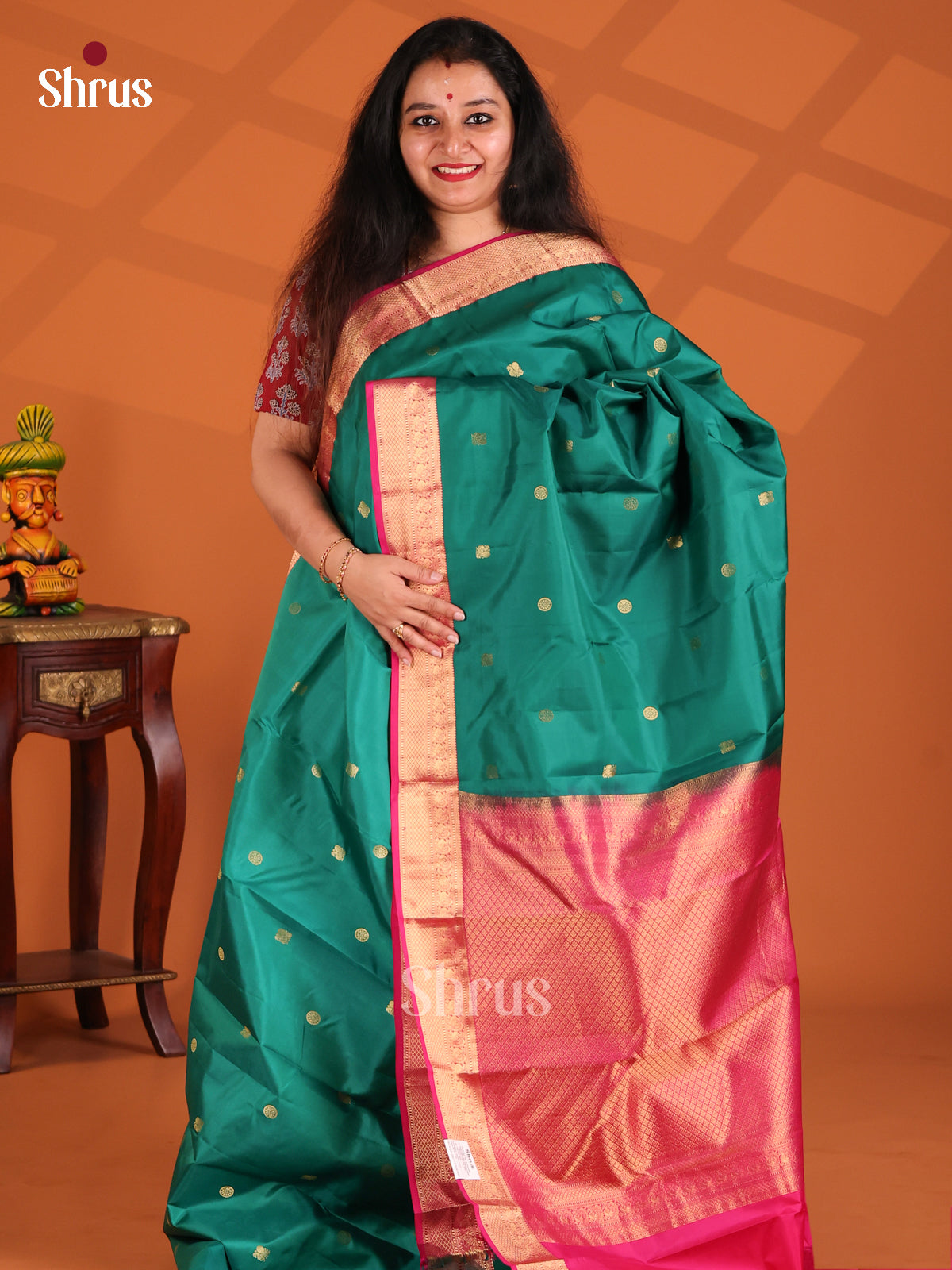 Serene Green Kanchipuram silk Saree with floral , peacock zari buttas-1