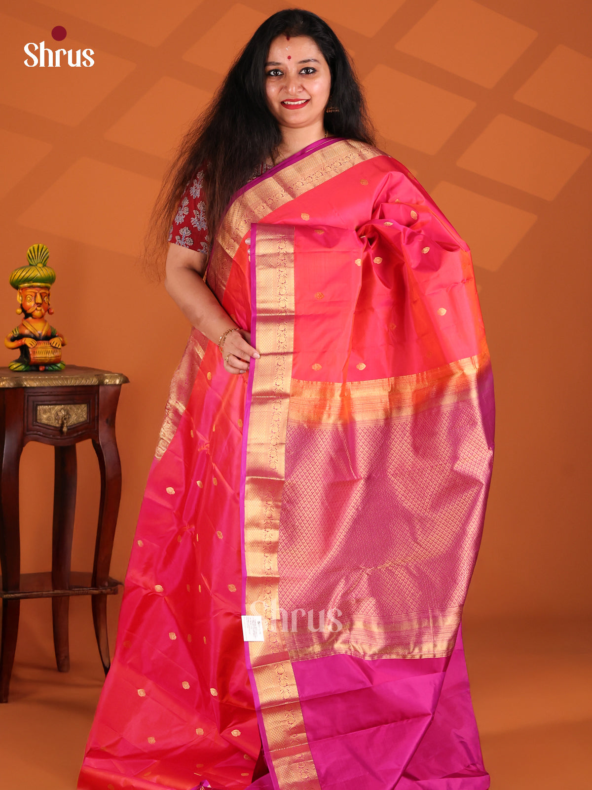 Charming Pink Kanchipuram silk Saree with Majenta zari woven floral vine border