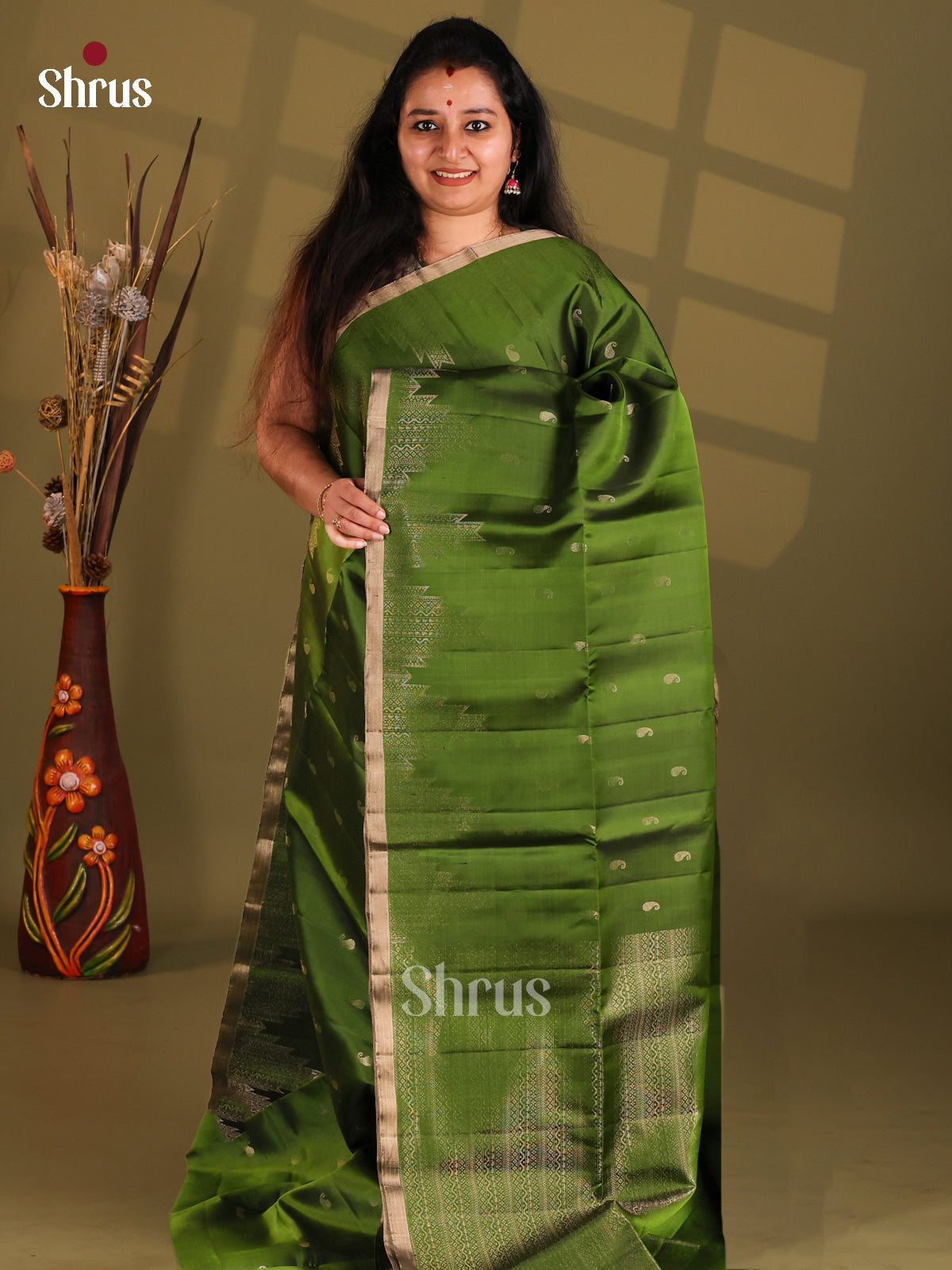 Green single tone Soft Silk (HR) Saree gleams witgh zari manga buttas , temple border - Shop on Shrus.com