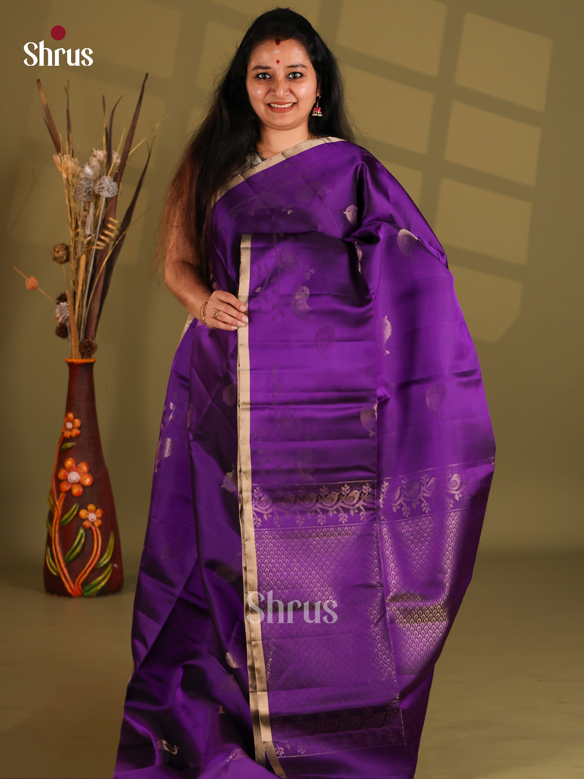 Violet Single tone Soft Silk (HR) Saree gleams with gold zari birds buttas