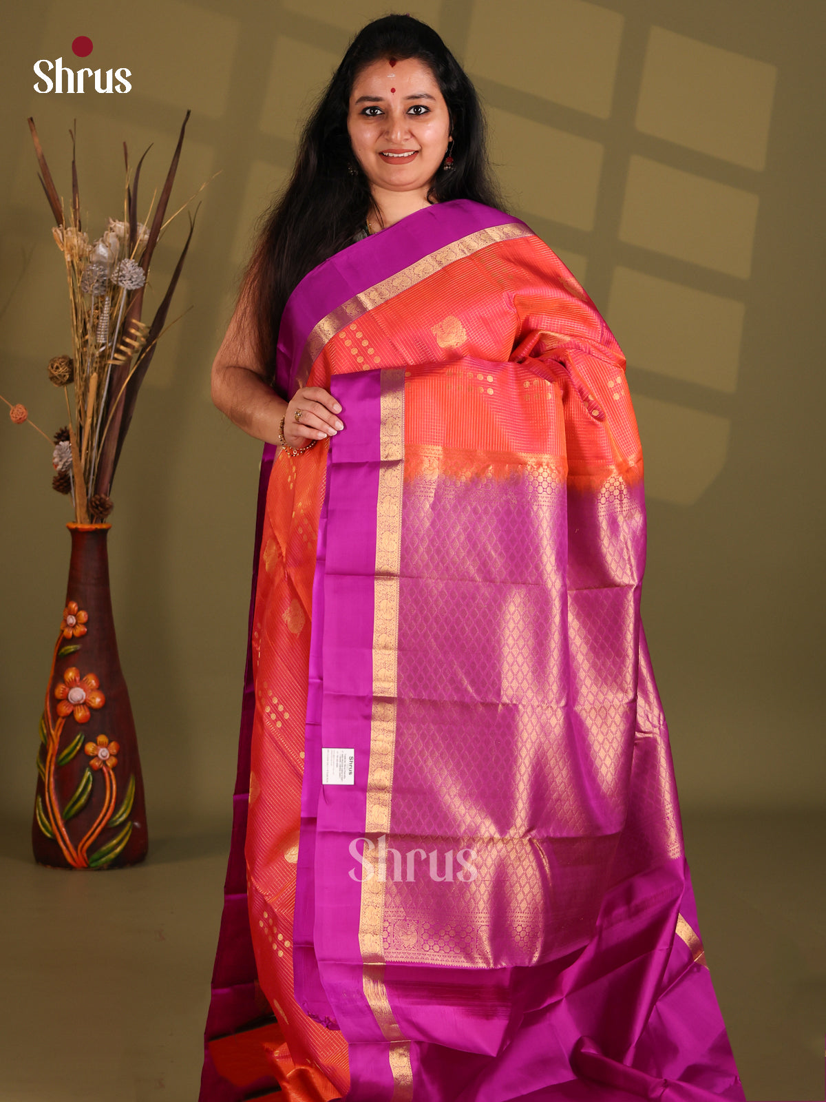 Orange and Purple Kanchipuram silk (HR) Saree gleams with peacock buttas-1