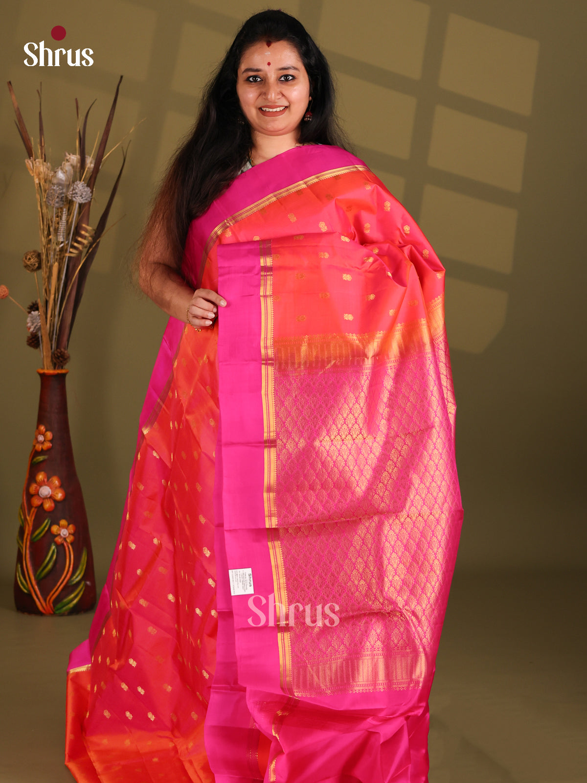 Orange and Pink Kanchipuram silk (HR) Saree gleams with gold zari floral buttas-1