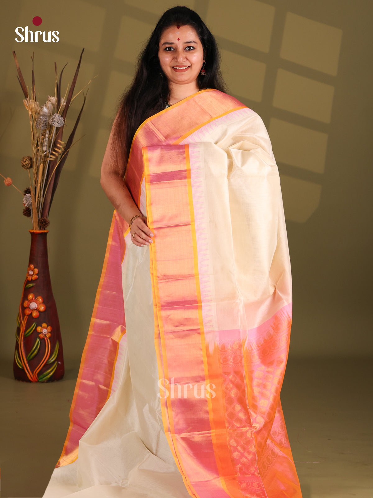 Cream and peach Silk Cotton Saree with floral brocade pallu