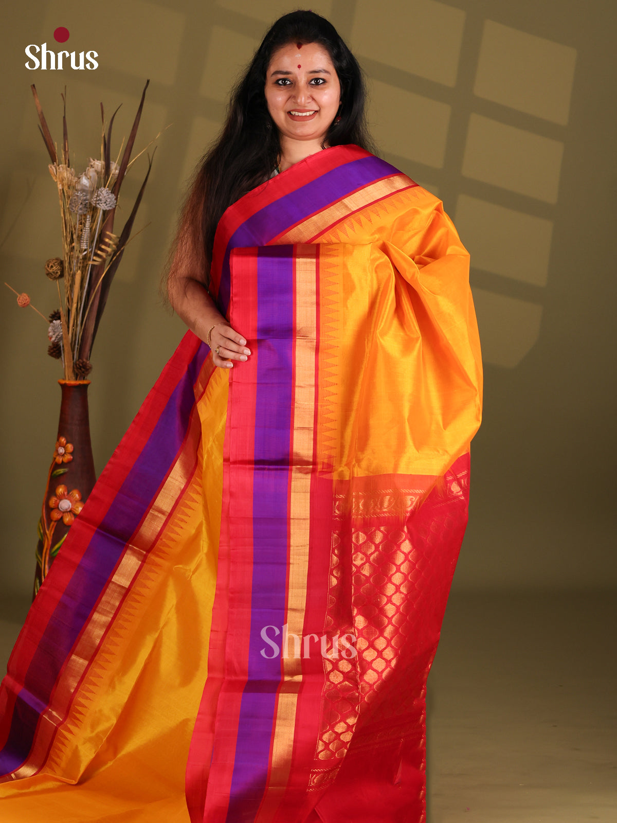 Mustard and Red Silk Cotton Saree with temple border