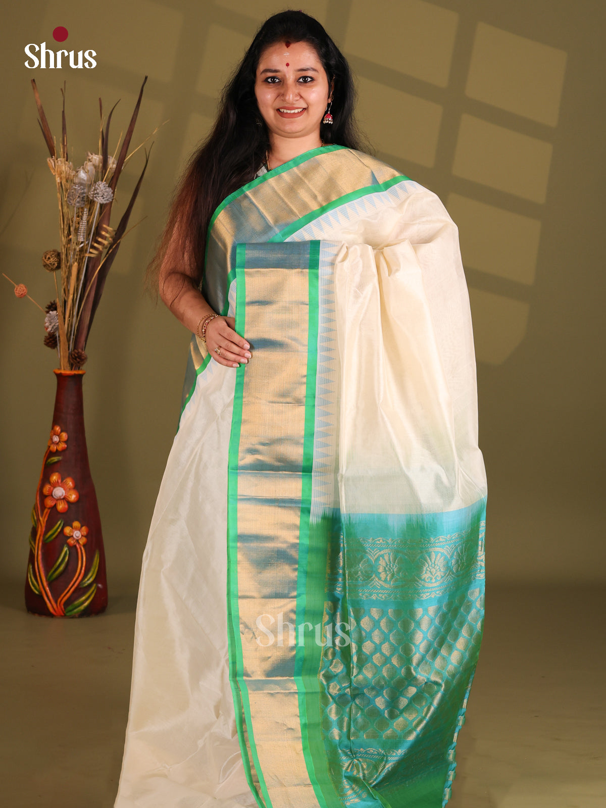 Cream & Teal Silk Cotton Saree with tissue zari border