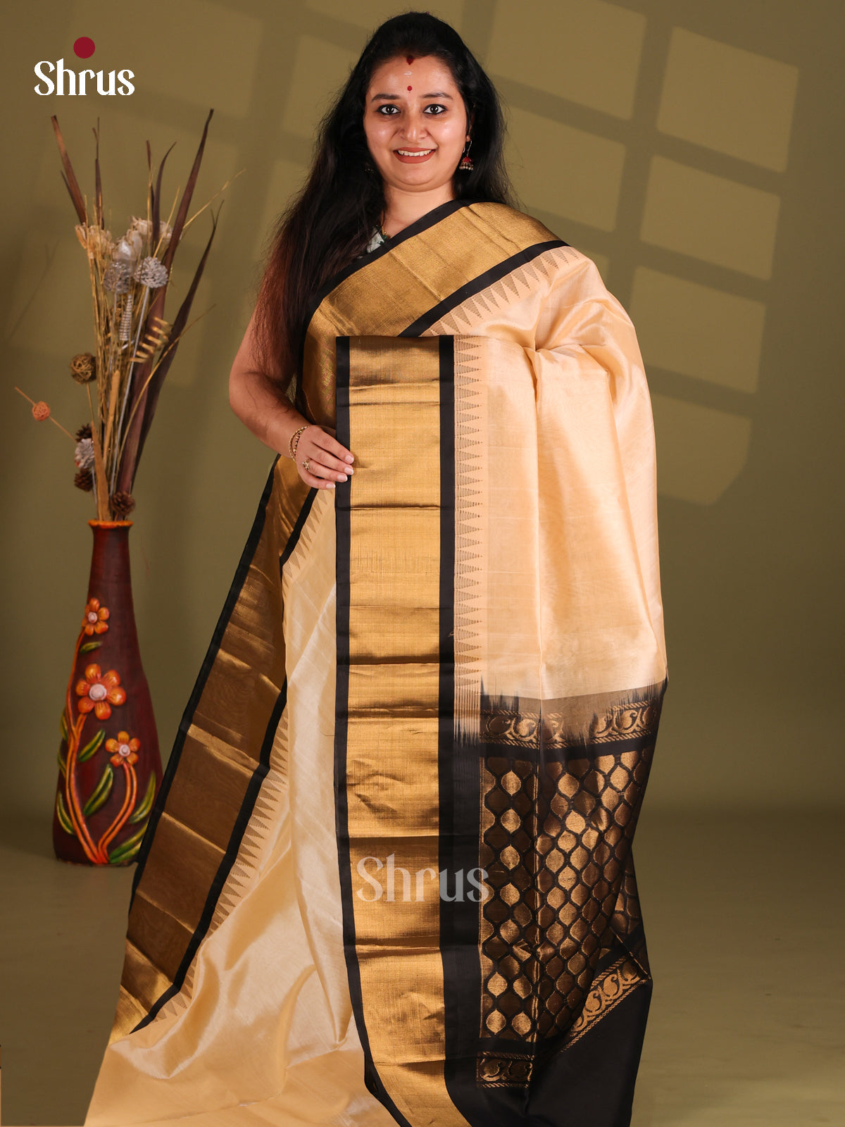Cream & Black Silk Cotton Saree with floral brocade pallu