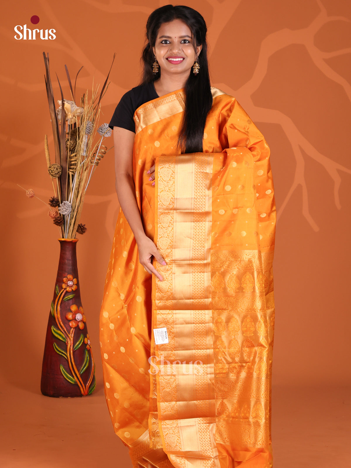 Dazzling Mustard Kanchipuram Silk saree gleams with floral zari buttas - Shop on Shrus.com