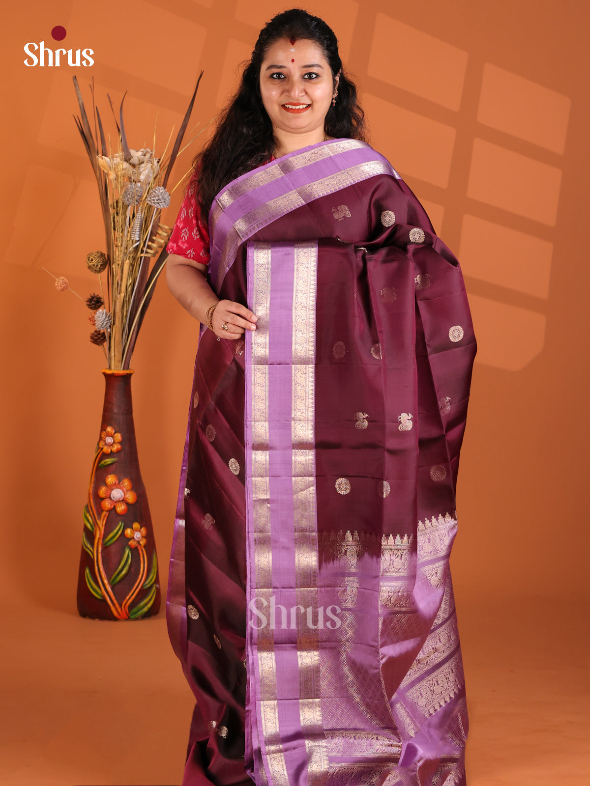 Classy Maroon Soft Silk Saree with zari peacock buttas & Rettaipet border