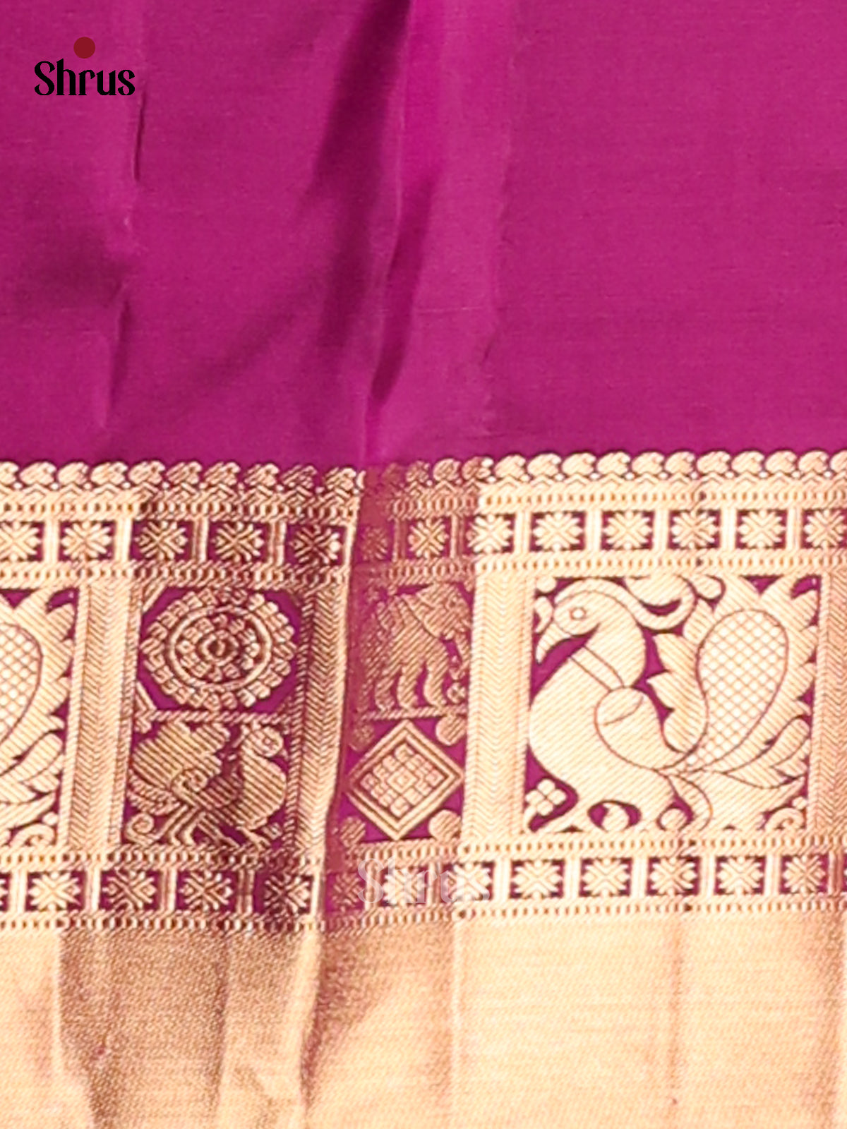 Charming Purple Kanchipuram silk Saree gleams with zari floral brocade