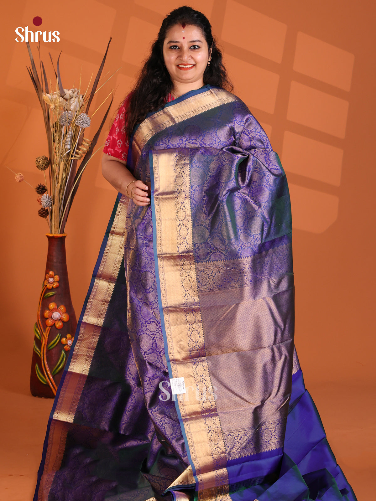 Chic Blue Kanchipuram silk Saree with floral nestling brocade