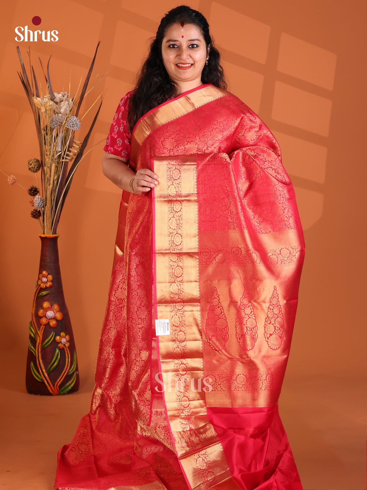 Beautiful Red Kanchipuram silk Saree with zari floral nestling brocade