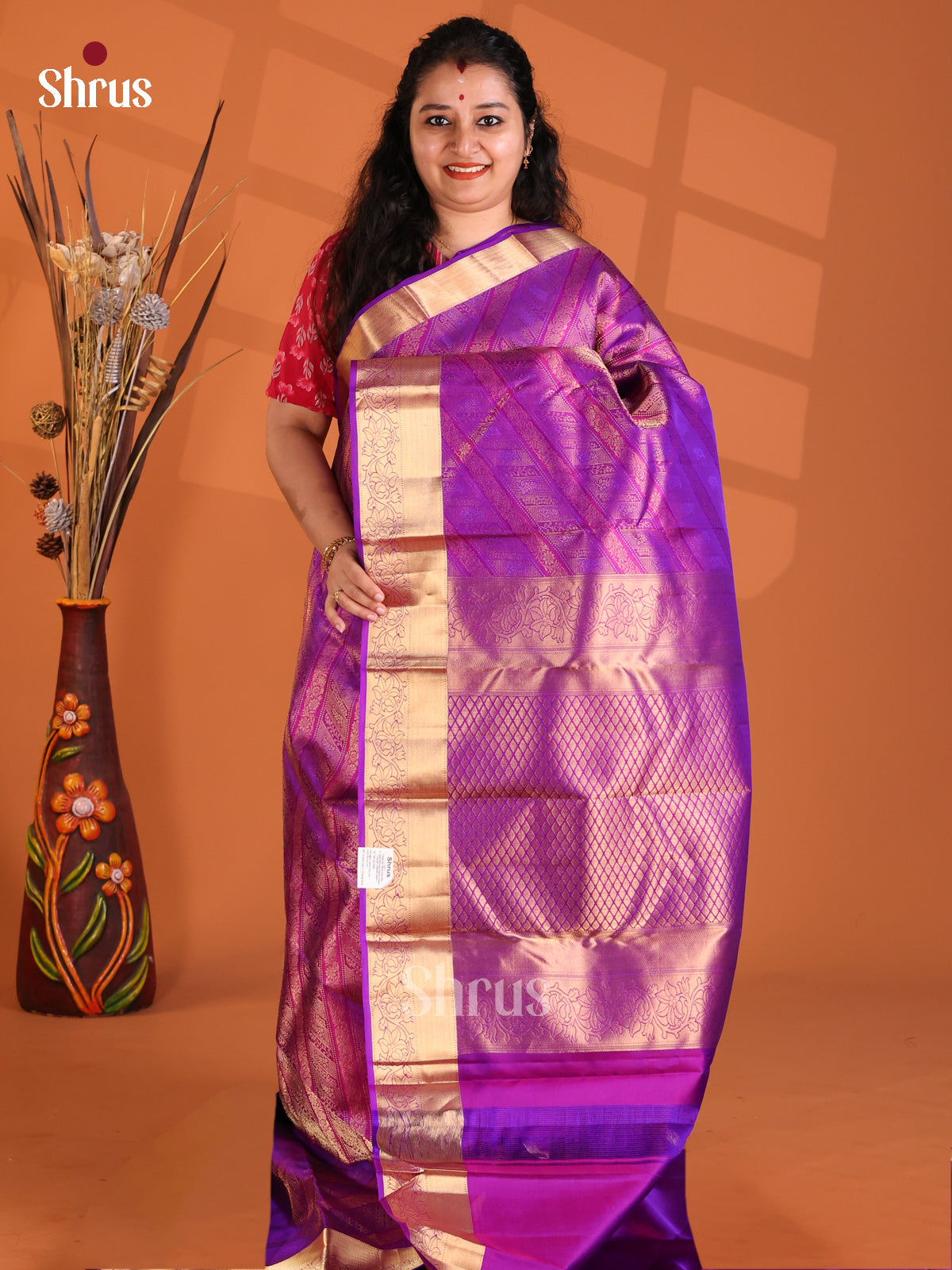Beautifully crafted Purple single tone Kanchipuram silk Saree with brocade