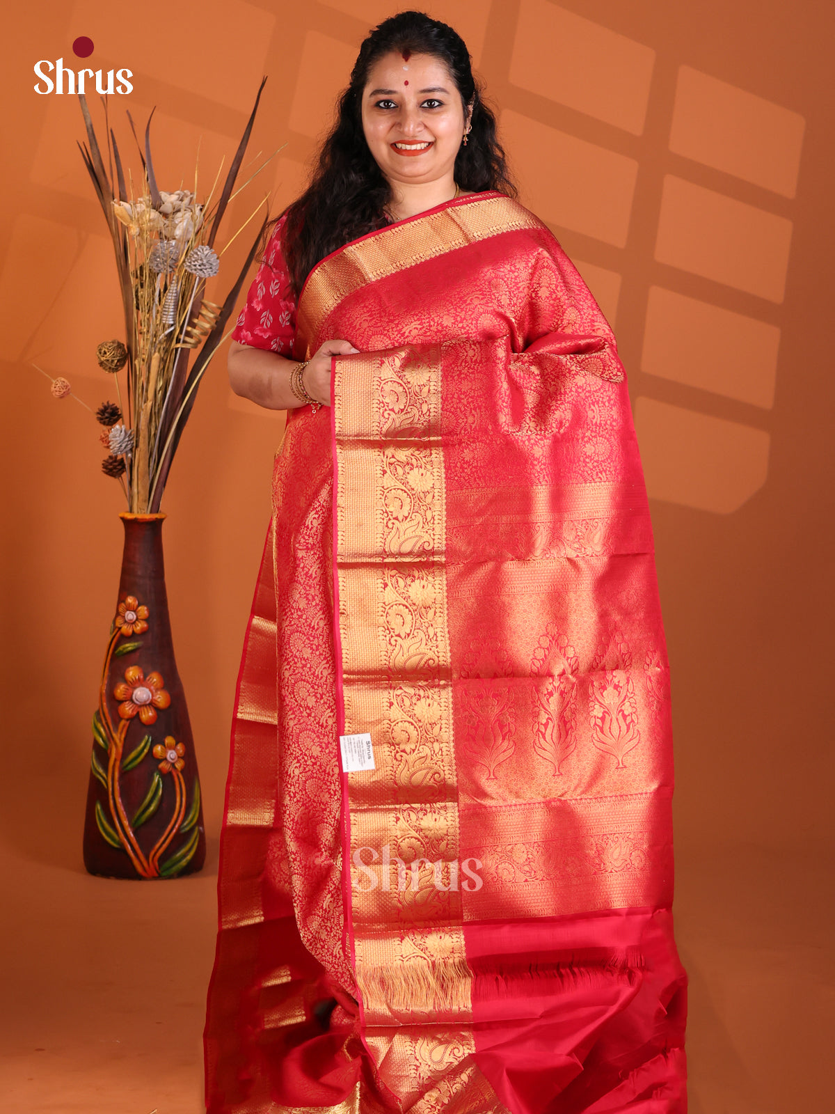 Bright Red single Tone Kanchipuram silk Saree with gold zari floral brocade