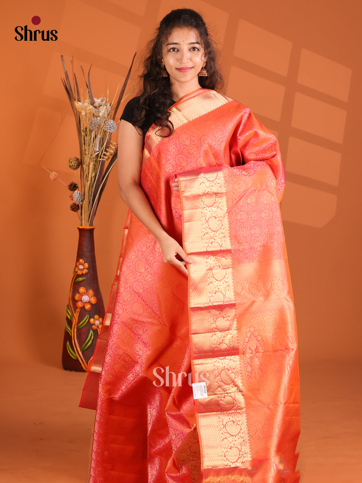 Beautiful Orangish Pink Single Tone Kanchipuram silk Saree with floral nestling brocade-1