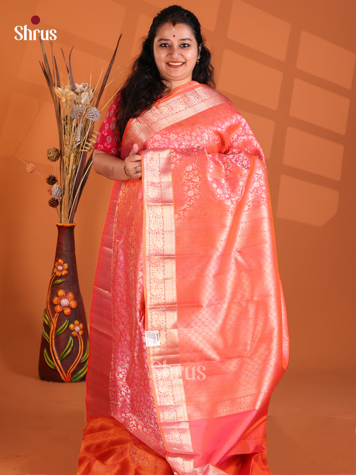 Glimmering Orangish Pink Kanchipuram silk Saree with zari floral nestling brocade-1