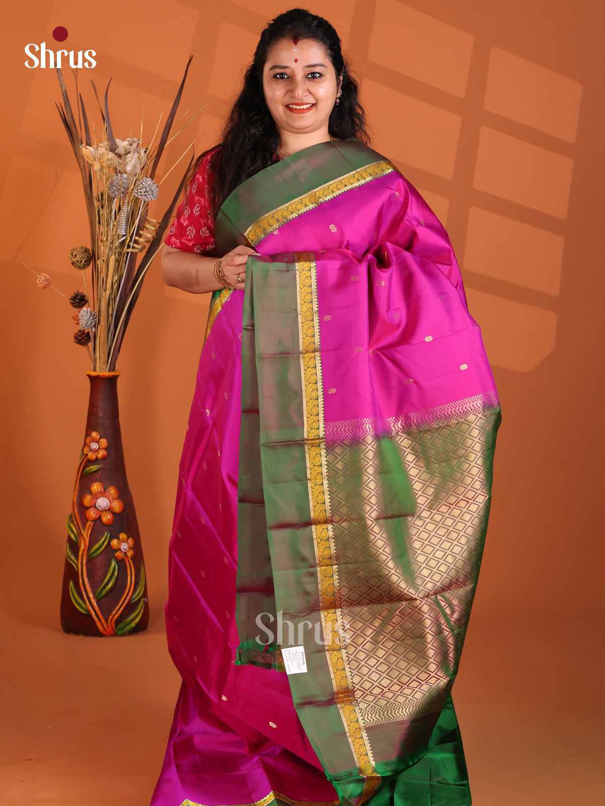 Majenta Pink & Green Kanchipuram silk Saree with criss cross brocade pallu