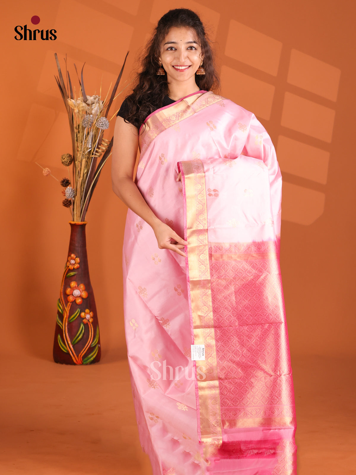 Stunning Baby pink Kanchipuram silk Saree with zari buttas